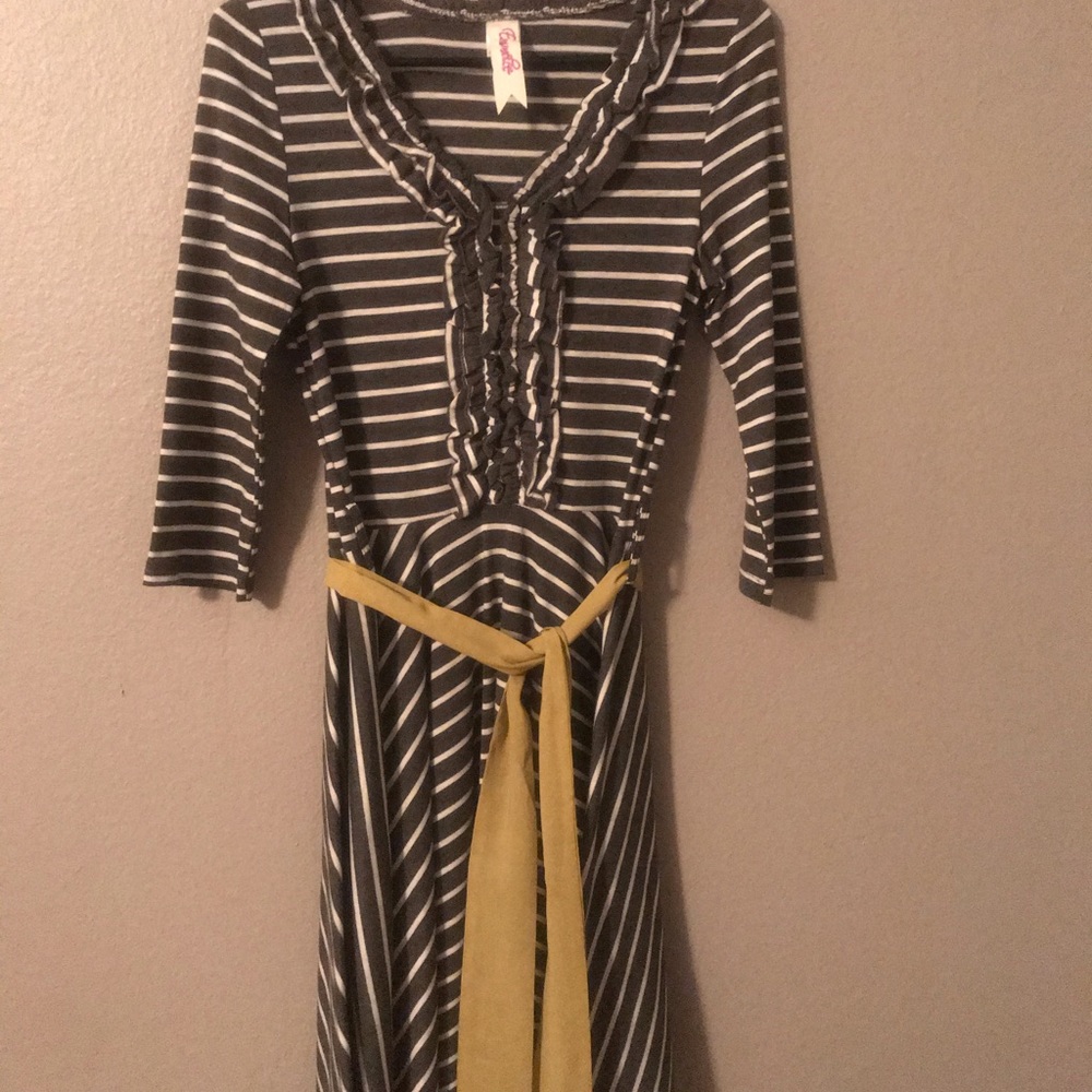 Gray and white ruffle dress.